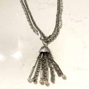 Silver tone pearl beaded multi-chain necklace.